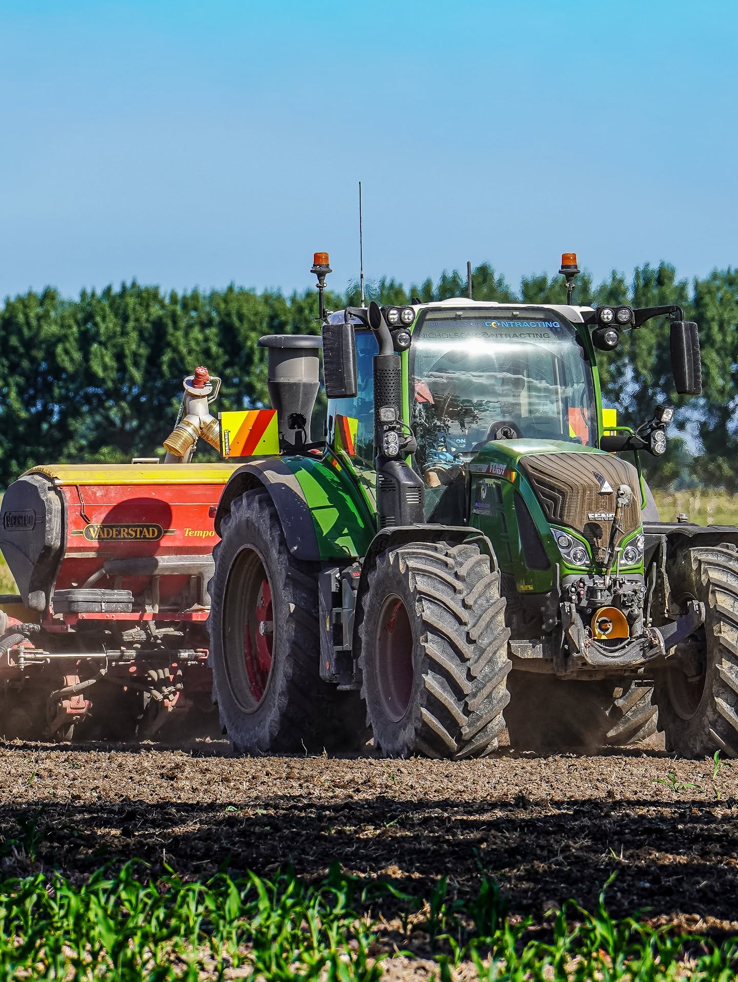 Nicholson Contractors tractor working a field